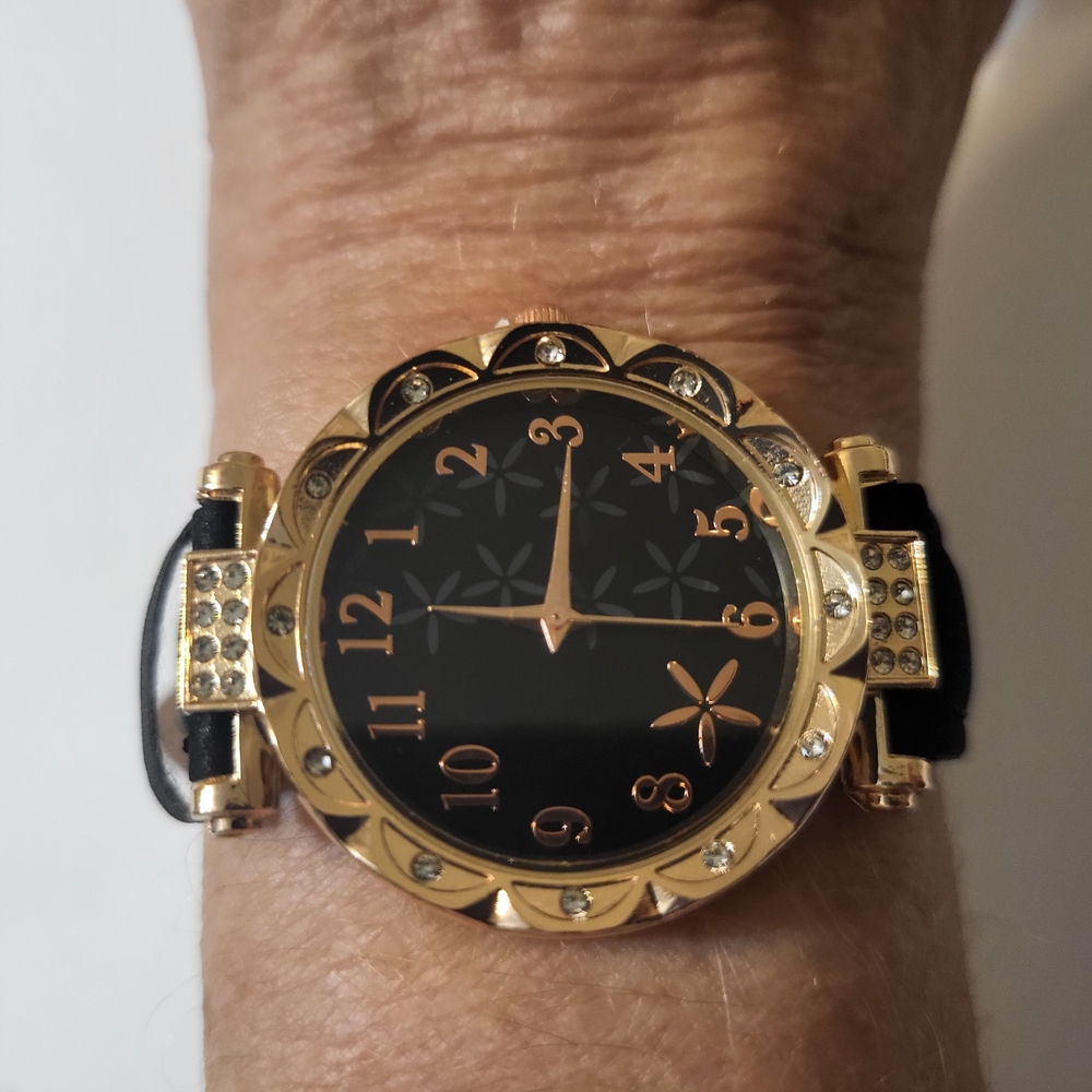 Elegant Gold and Black Watch with Crystal Accents